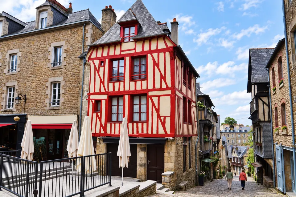 Rue du Jerzual, half-timbered houses down the cobbled hill to the port