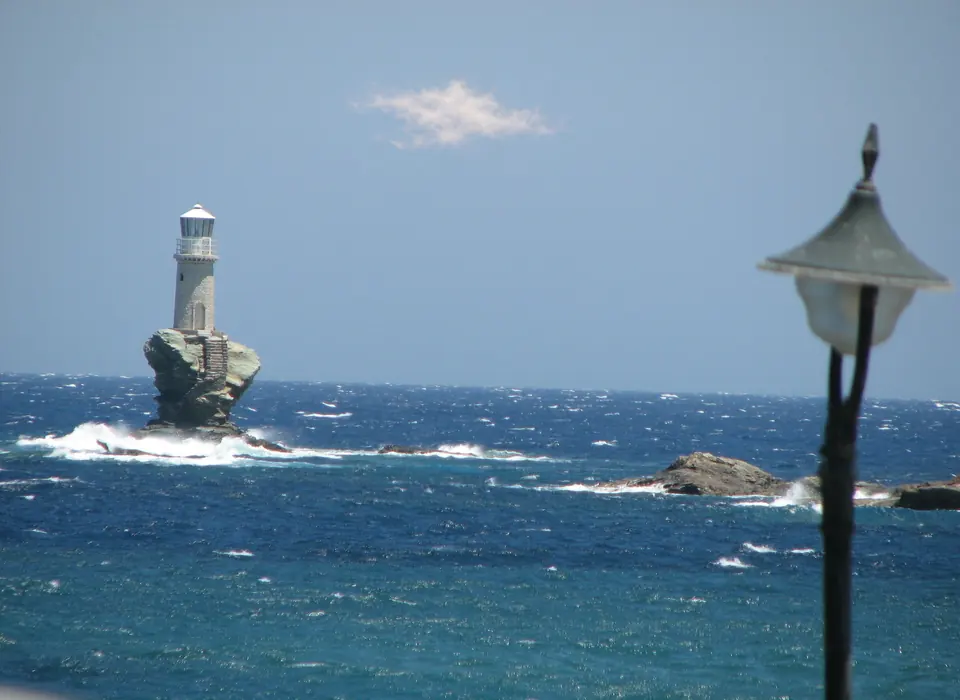 The Tourlitis lighthouse on its sea stack off Chora