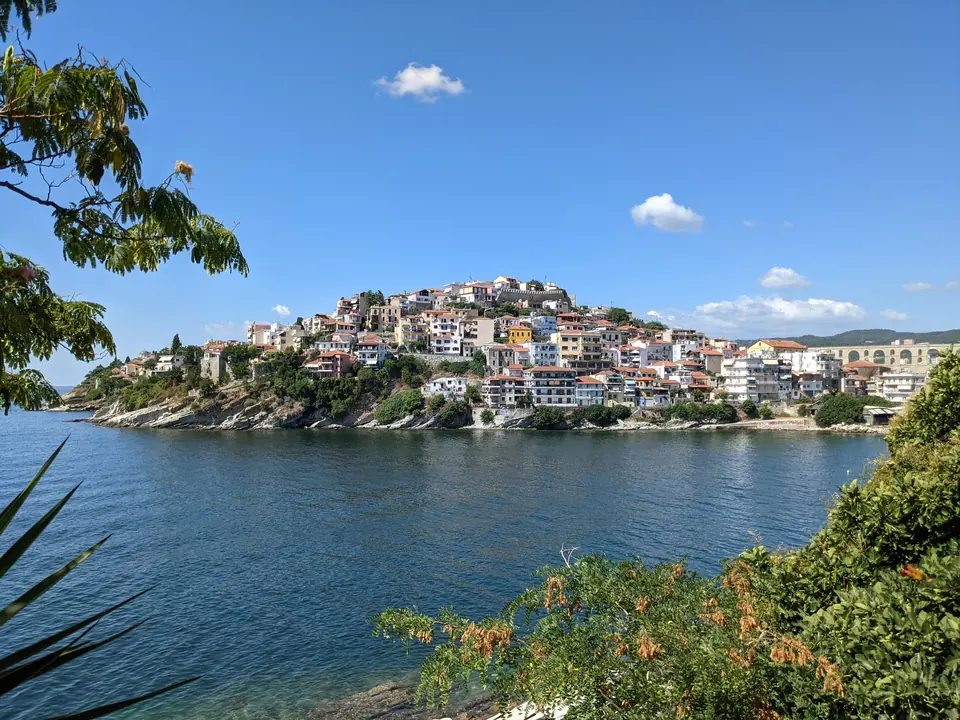 Kavala from the water, stacked up its headland under the castle