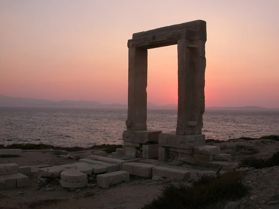 The marble door standing alone on its islet at the harbor mouth