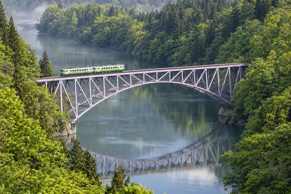 A Tadami Line train crossing the first Tadami River bridge