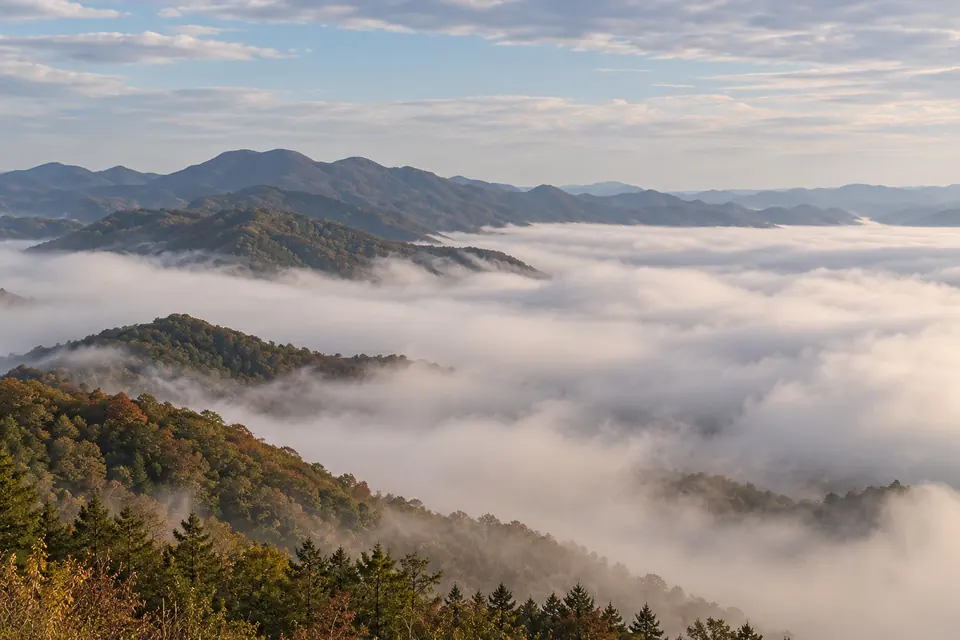 A sea of morning fog filling the basin