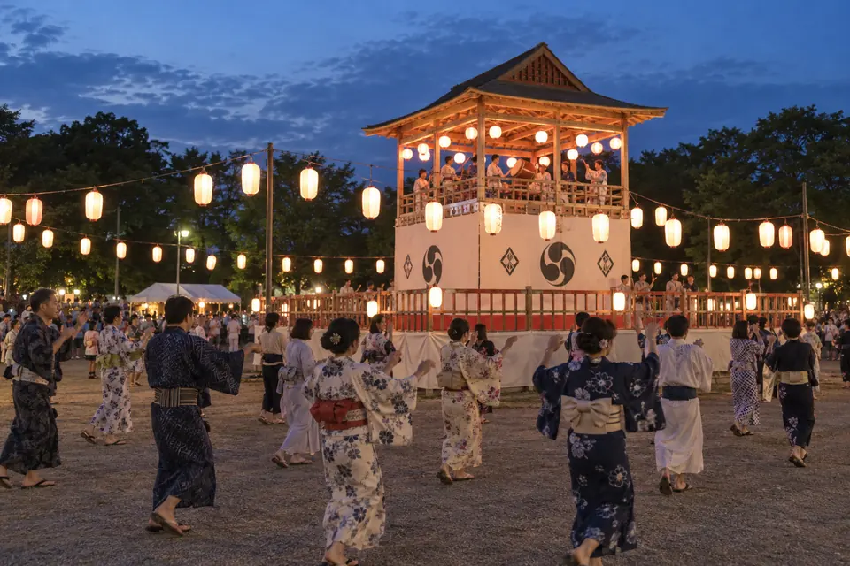 Dekansho festival dancers circling the tower