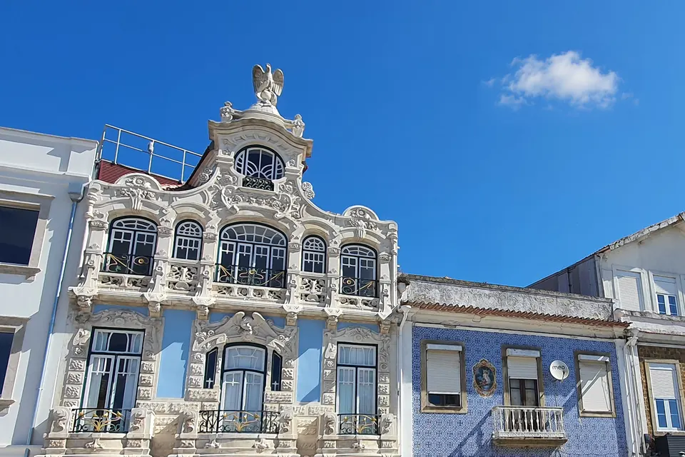 An Arte Nova facade, tiled and wrought-iron
