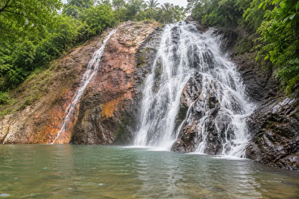 Na Mueang waterfall in the forest