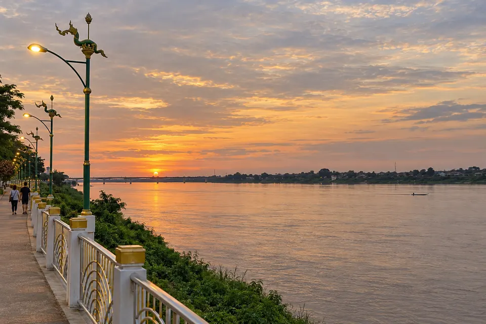 The Mekong promenade at sunset, Laos on the far bank