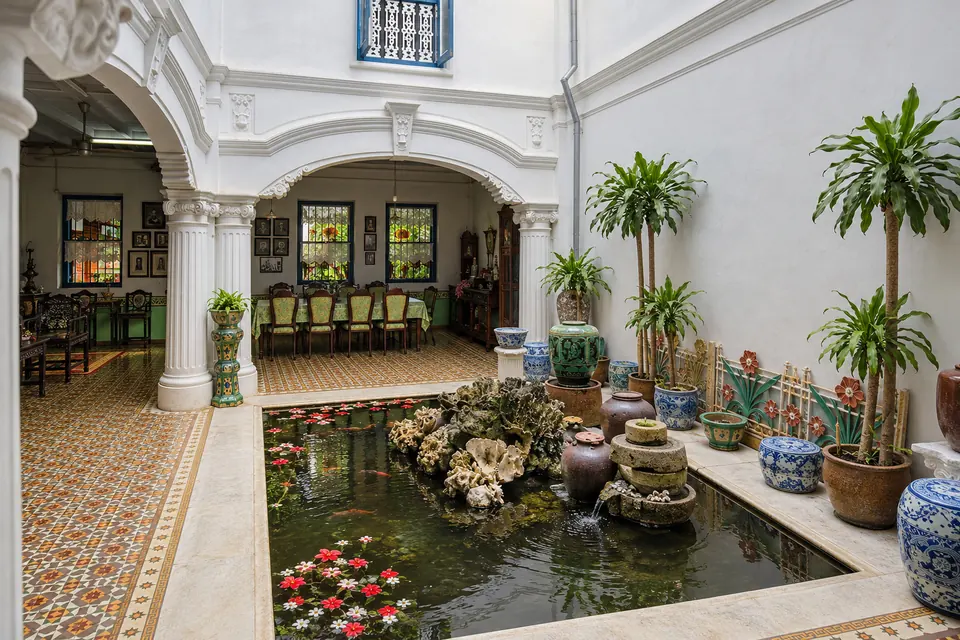 Chinpracha House, the tiled courtyard of a tin family's home