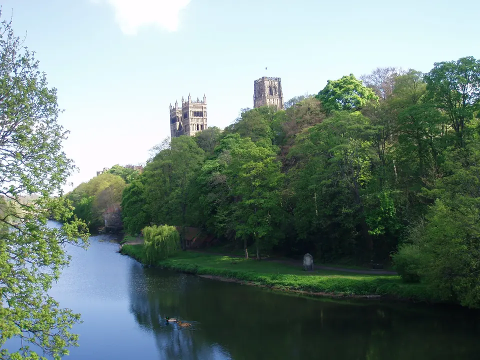 The cathedral towers above the trees from Prebends Bridge