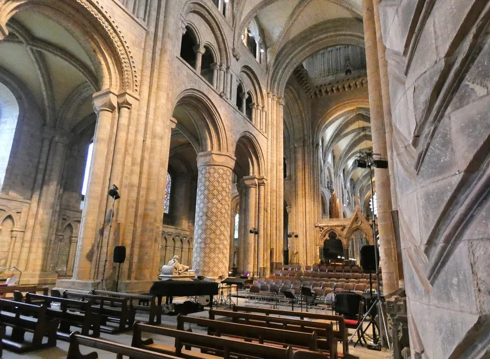The carved Norman piers of the cathedral nave