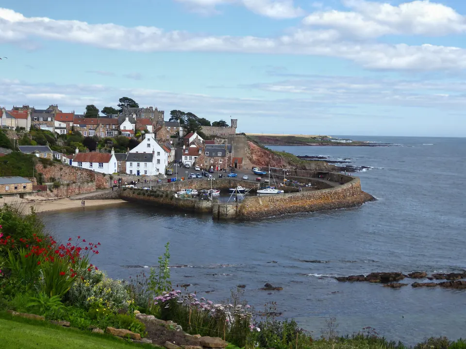 Crail harbor, stone houses around the water
