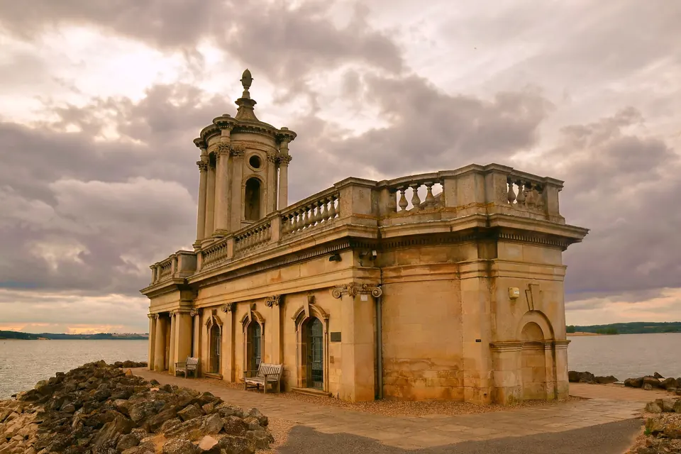 Rutland Water at sunset with Normanton Church